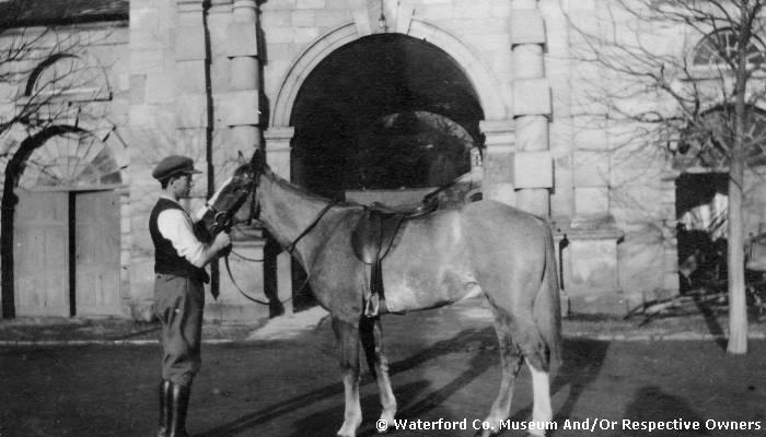 P Cunningham Holding A Horse