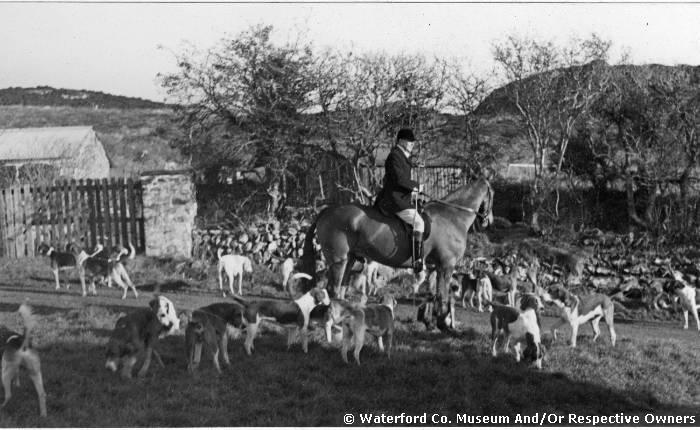 Huntsman Dick Russell Surrounded By Hounds