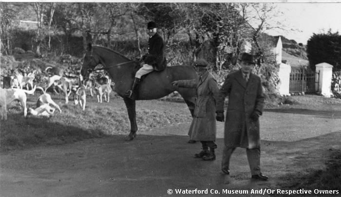 Huntsman With Dogs And Two Pedestrians
