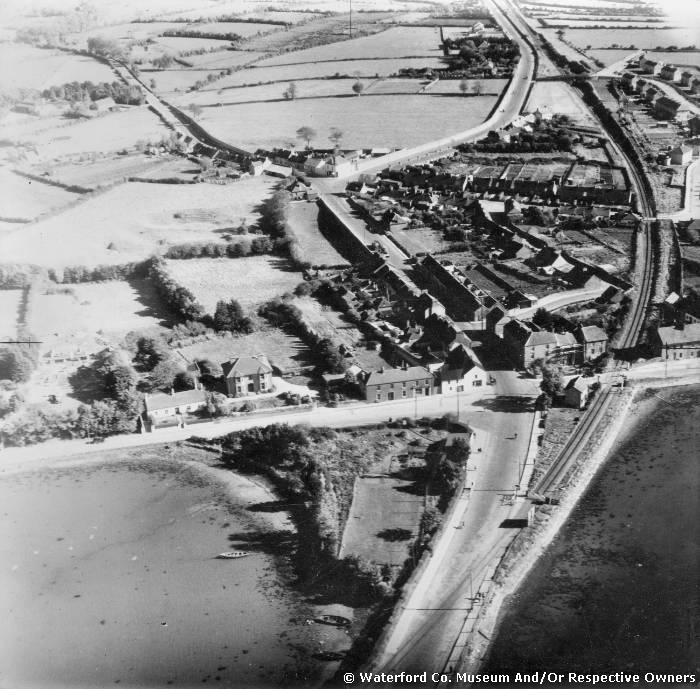 Aerial View Of Causeway, Railway Line And Abbeyside Village